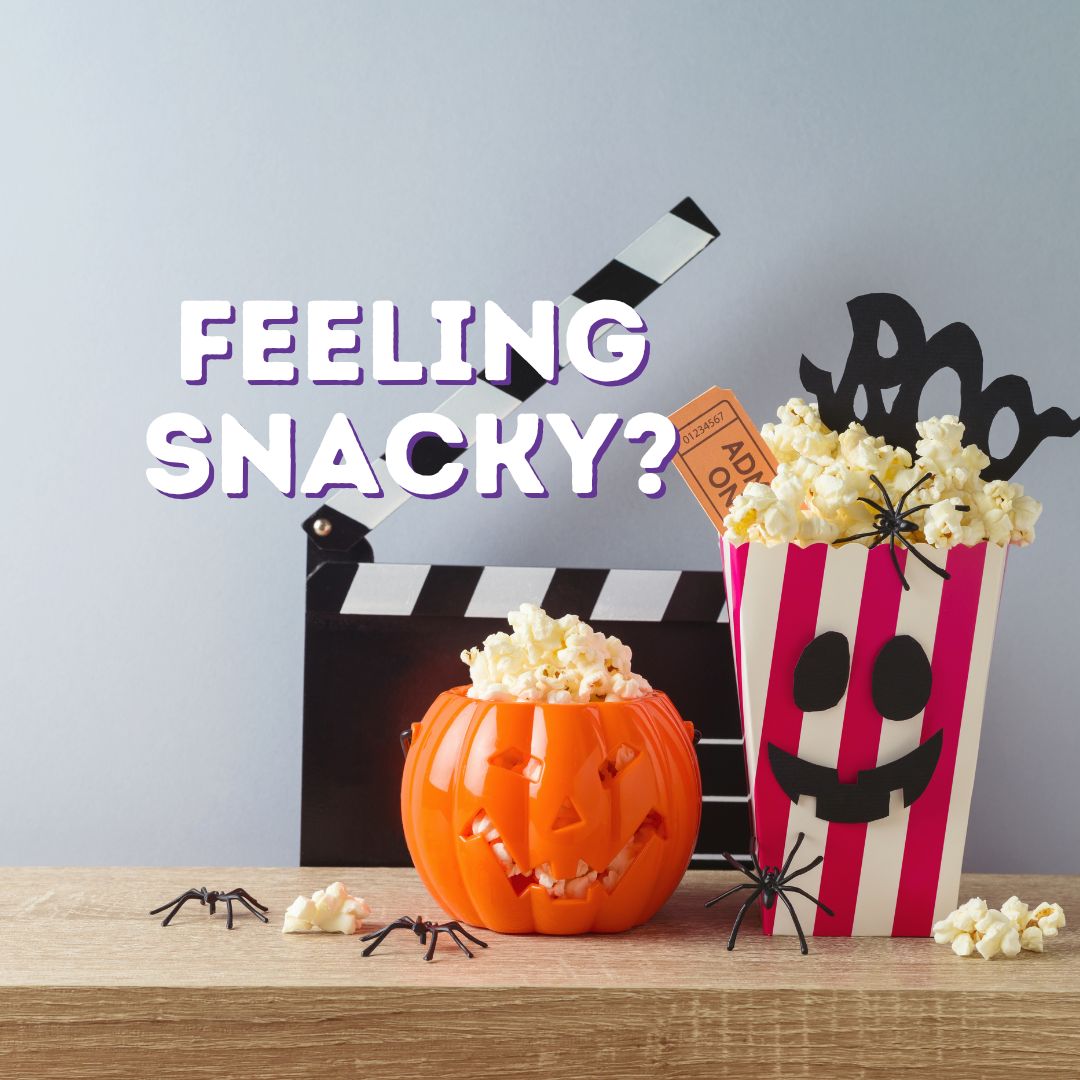 Halloween popcorn and pumpkin for a halloween movie party