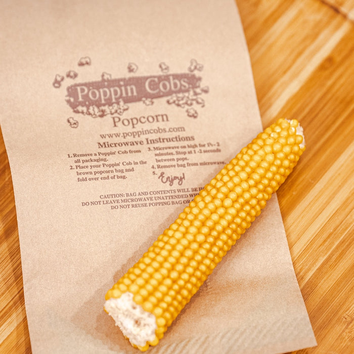 Rustic popcorn on the cob popping for a fun snack