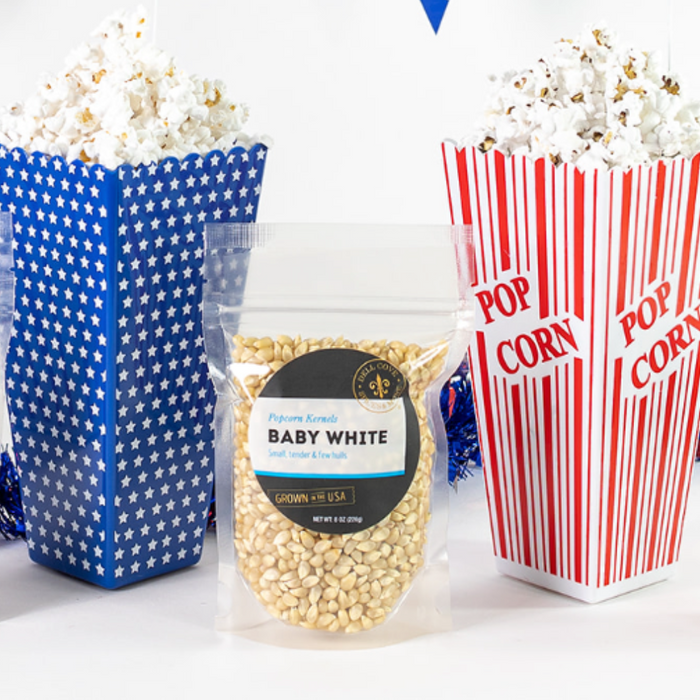 Baby white popcorn with popped popcorn in patriotic popcorn boxes - Dell Cove Spices